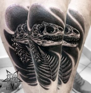Tattoo скелет динозавра на ноге в реализме